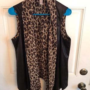 Chico’s top. With faux leather vest. Size 2.
